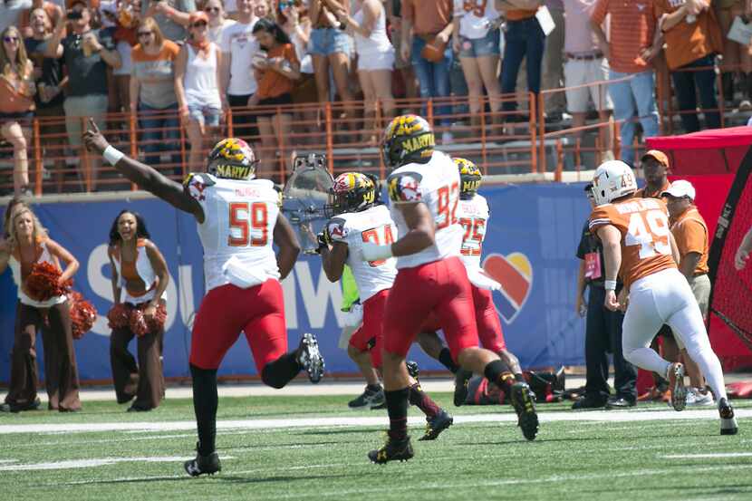 Maryland's Jacquie Veii returns a blocked field goal for a touchdown in second-quarter...