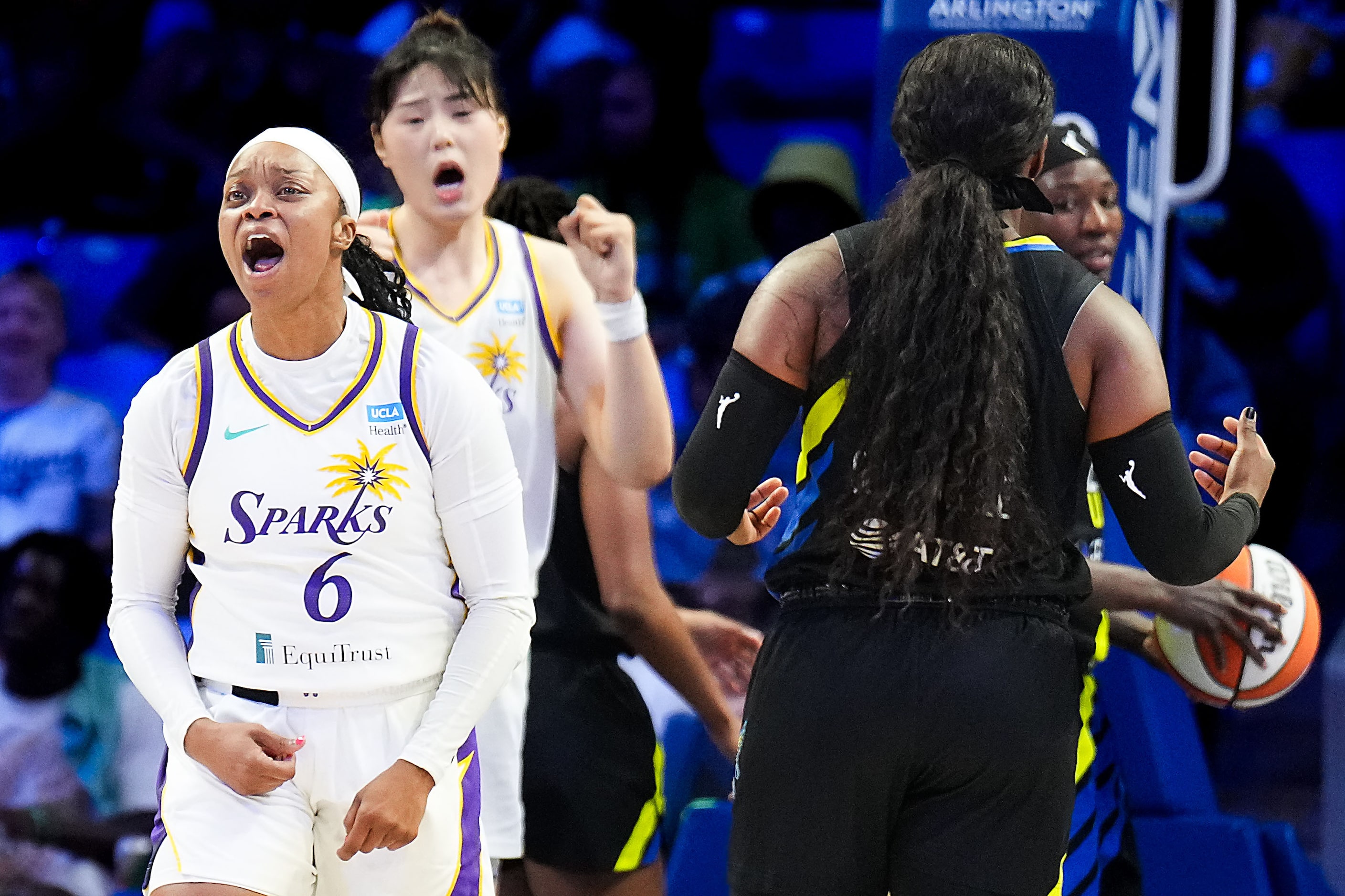 Los Angeles Sparks guard Odyssey Sims (6) celebrates after a basket during the first half of...