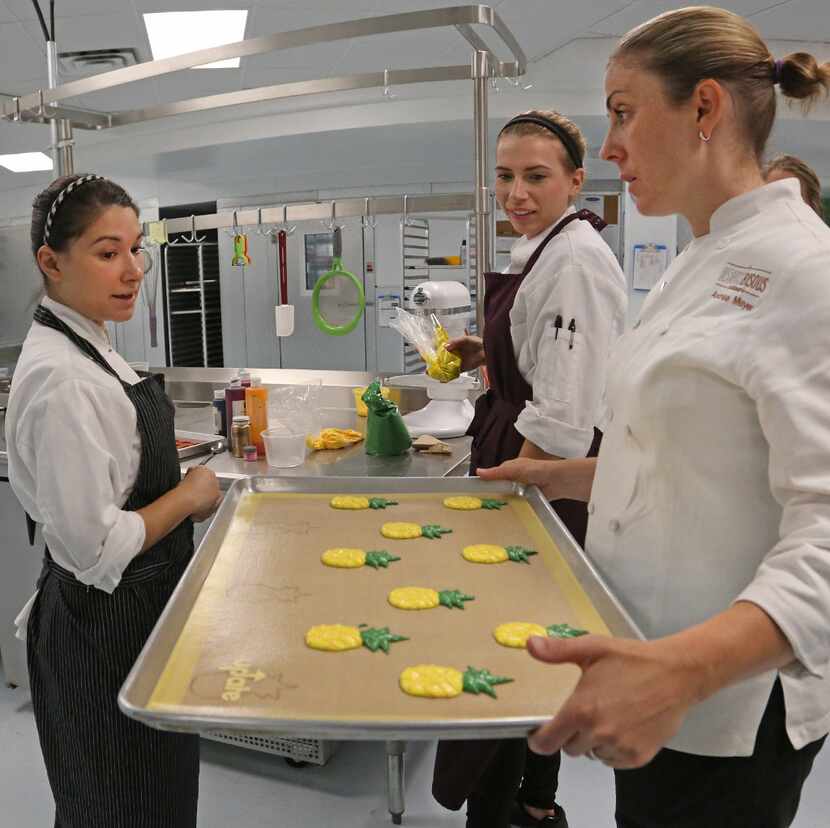 Elizabeth De Leon, Kelcie Feldotto and Andrea Meyer make macarons at Bisous Bisous...