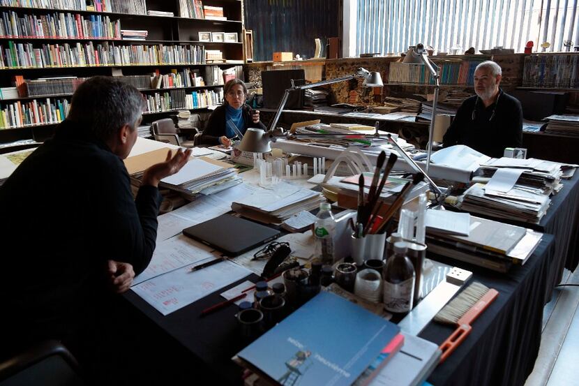 From left: Aranda, Pigem and Vilalta confer in their office in Olot. (Agence France-Presse) 