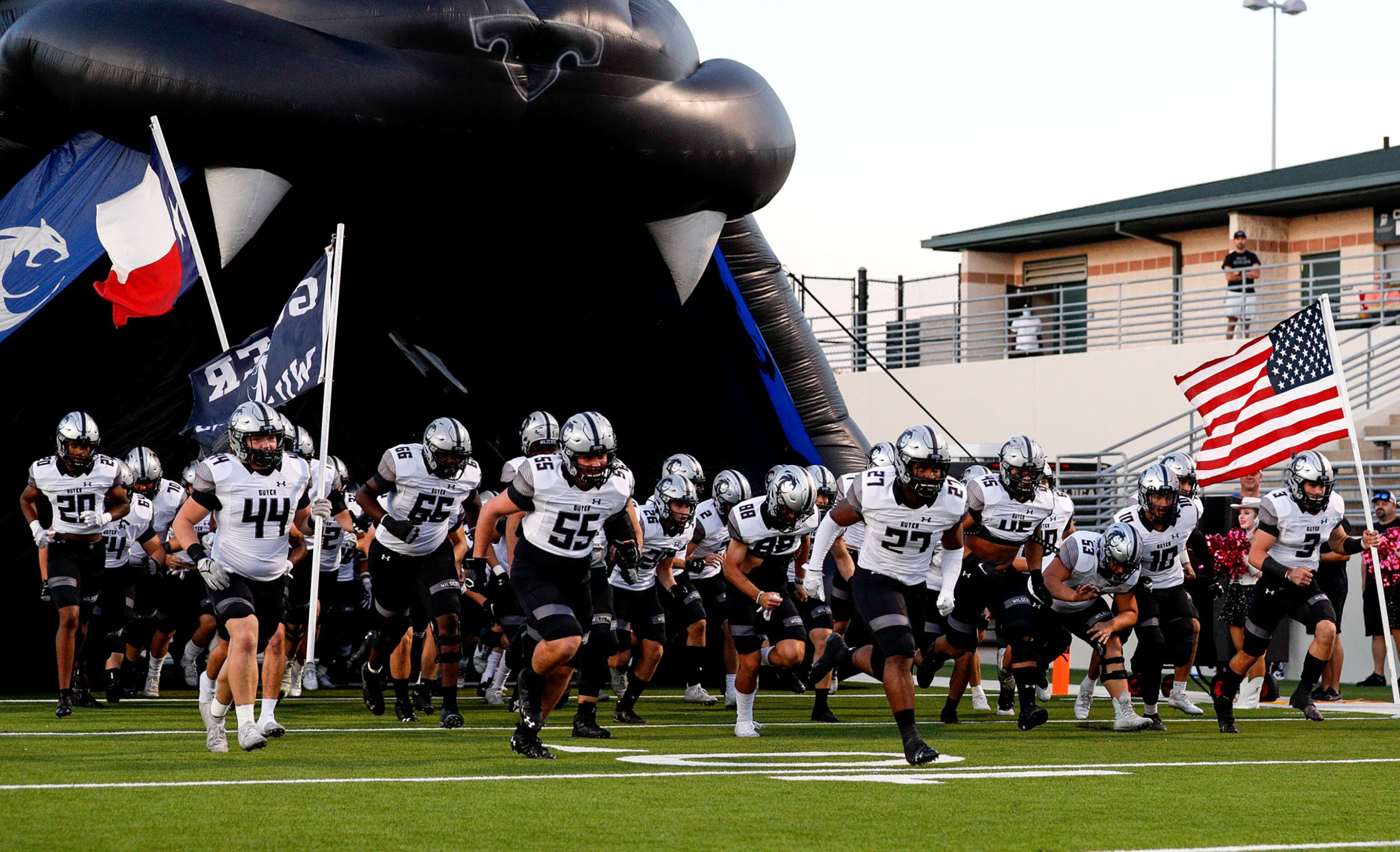 The Denton Guyer Wildcats enter the field to face Denton Braswell in a District 5-6A high...
