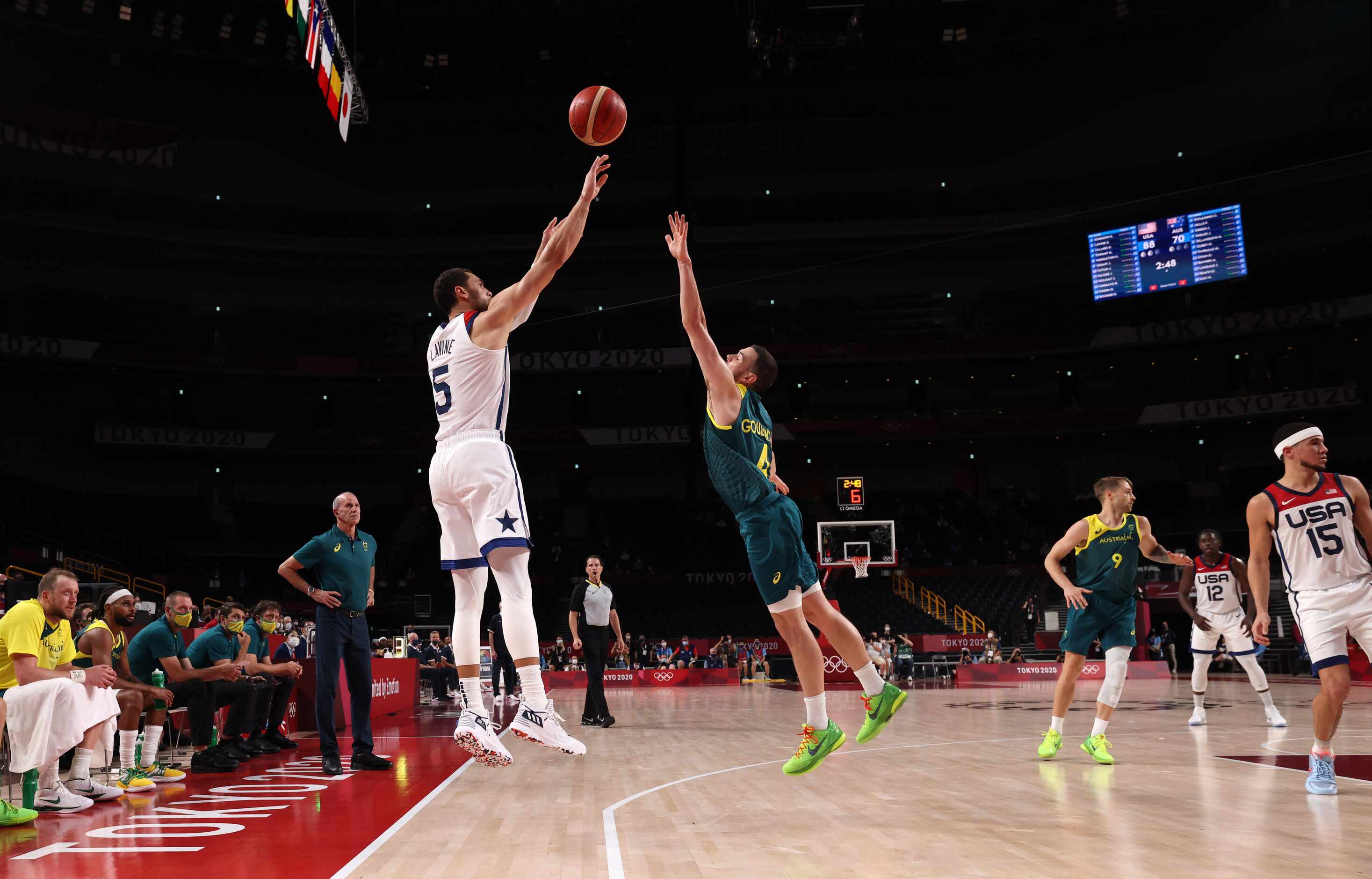 USA’s Zach Lavine (5) shoots a three pointer over Australia’s Chris Goulding (4) during the...