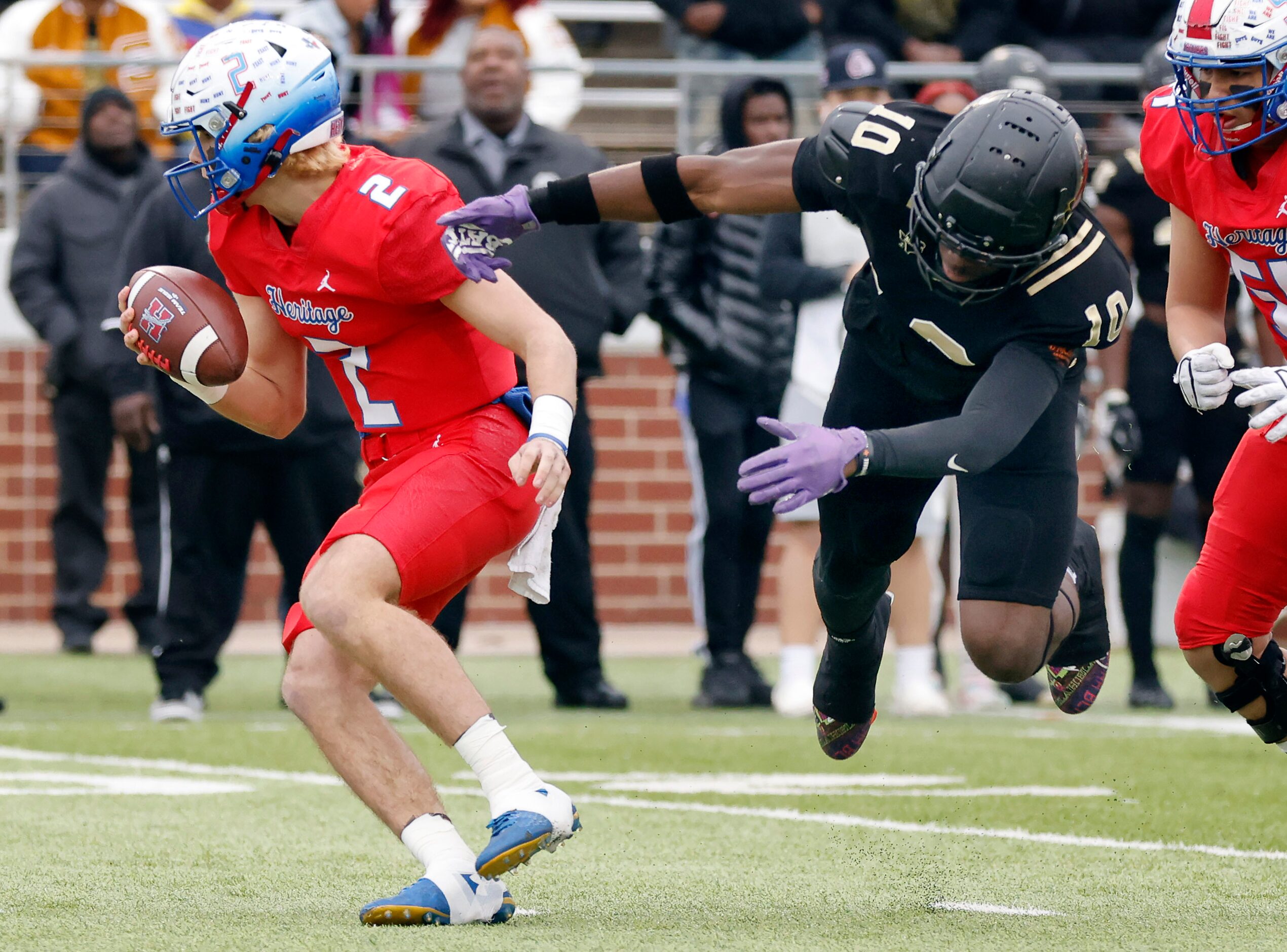 South Oak Cliff defensive lineman Billy Walton (10) makes a diving tackle attempt of...