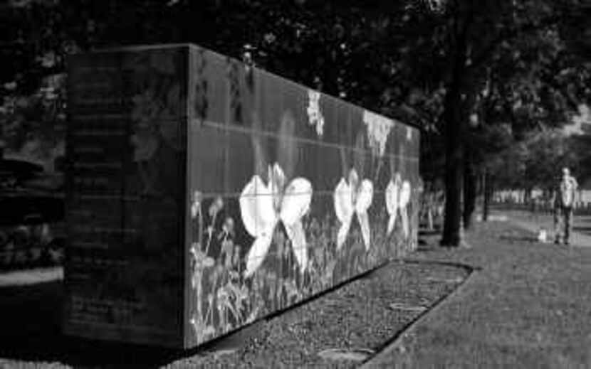  Above: Carolyn Brown's Paradise Garden Wall  sits on the Leonard Street median in front of...