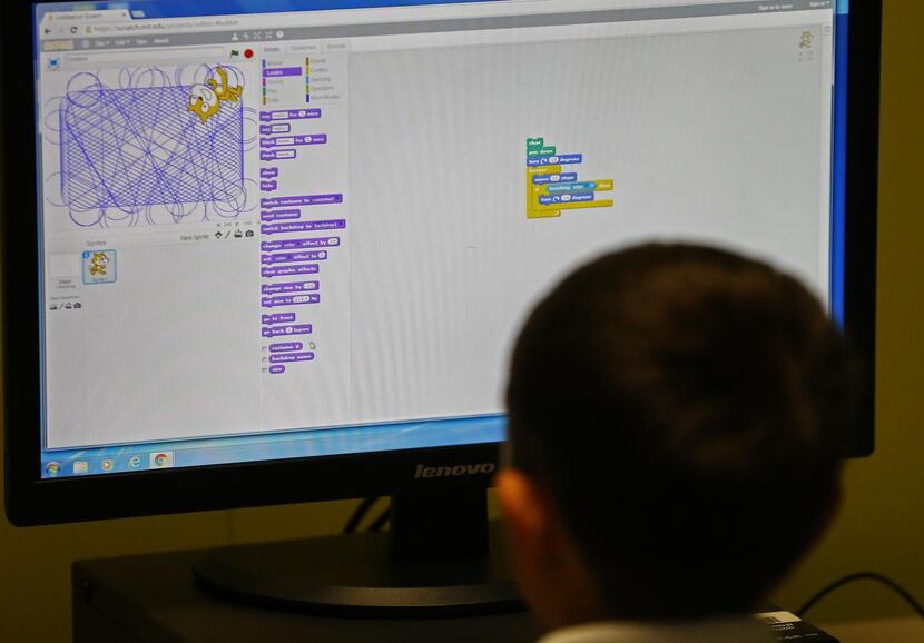 
Jackson Medoff looks at the program Scratch during a meeting of the coding club at Herfurth...