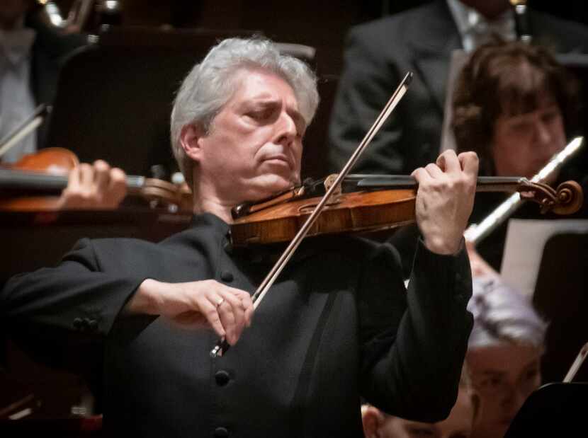 DSO Senior Principal Associate Concertmaster Gary Levinson performs the world premier of...
