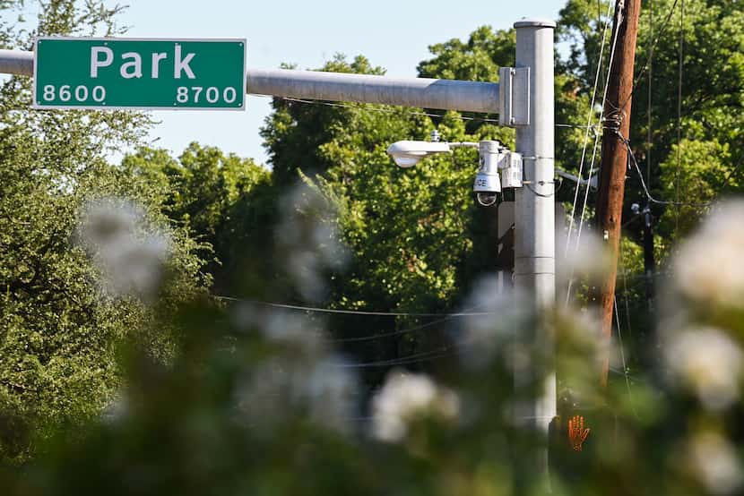 A DPD camera is on Eastridge Drive and Park Lane near a flower memorial site for Joseph...