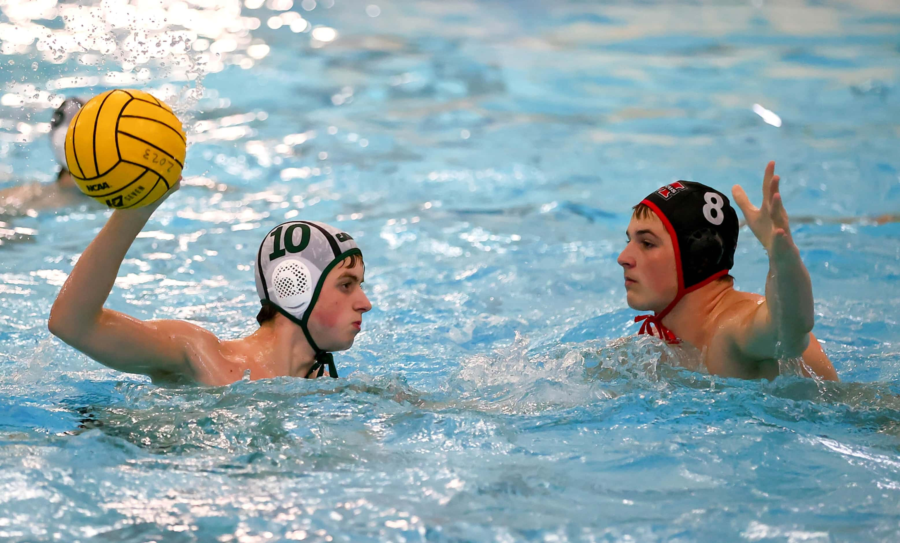 Southlake Carroll's Carter Smith looks to pass against Flower Mound Marcus' Joseph McCreary...