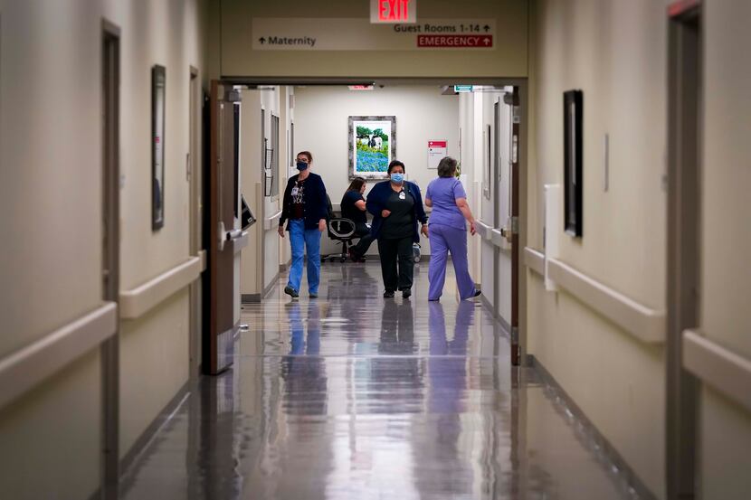 Staff at Faith Community Hospital move between rooms at the hospital on Thursday, May 14,...