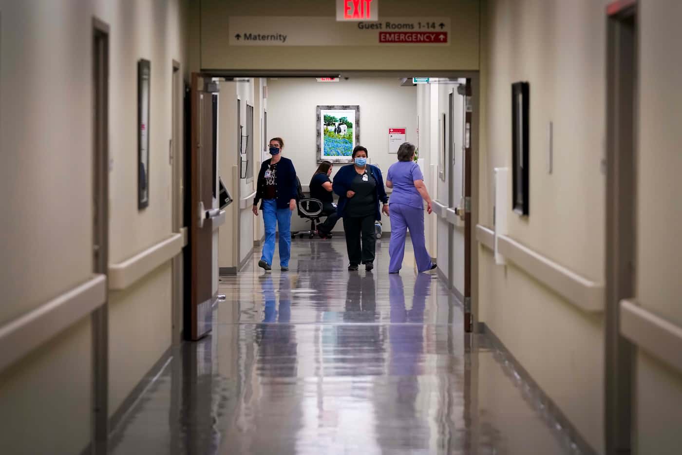 Staff members at Faith Community Hospital move between rooms on May 14.