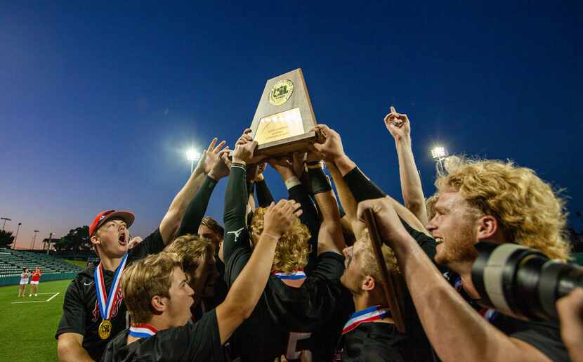 Argyle celebrate their win over Sweeny at their 4A UIL baseball state championship game at...