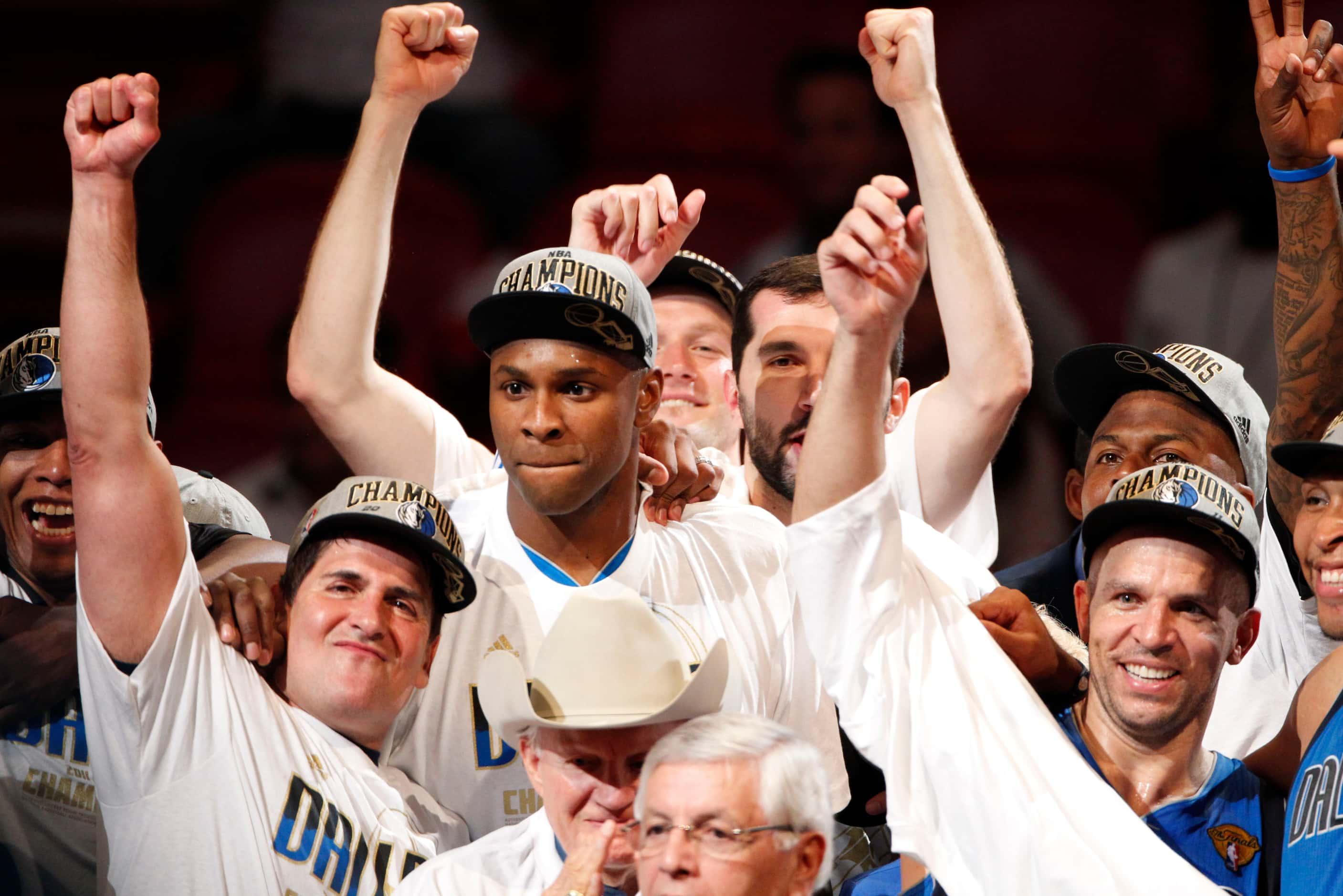 the Dallas Mavericks - including team owner Mark Cuban (bottom left), Brendan Haywood (above...