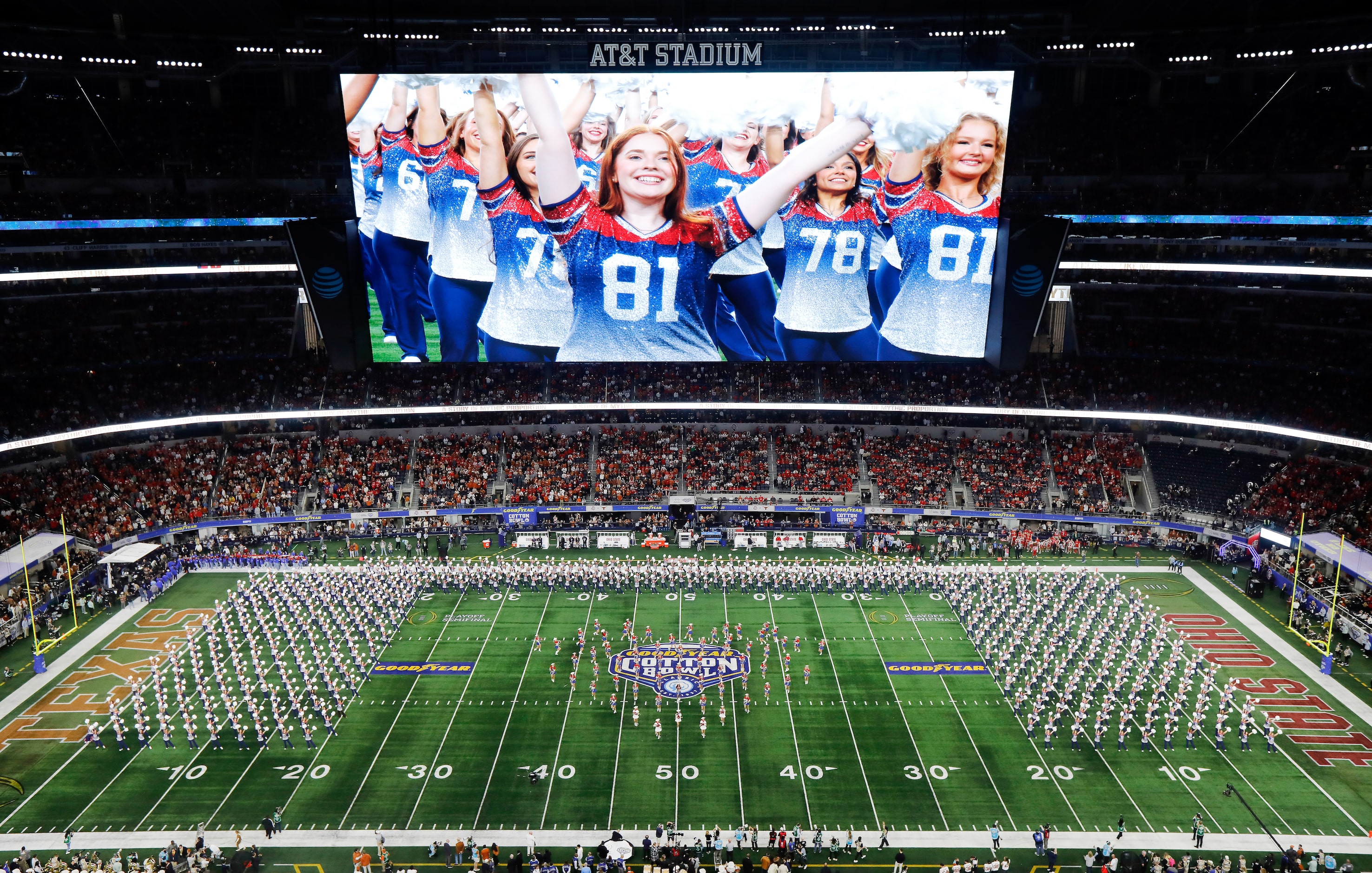 The Kilgore College Rangerettes and their alumni perform on the field before a CFP semifinal...