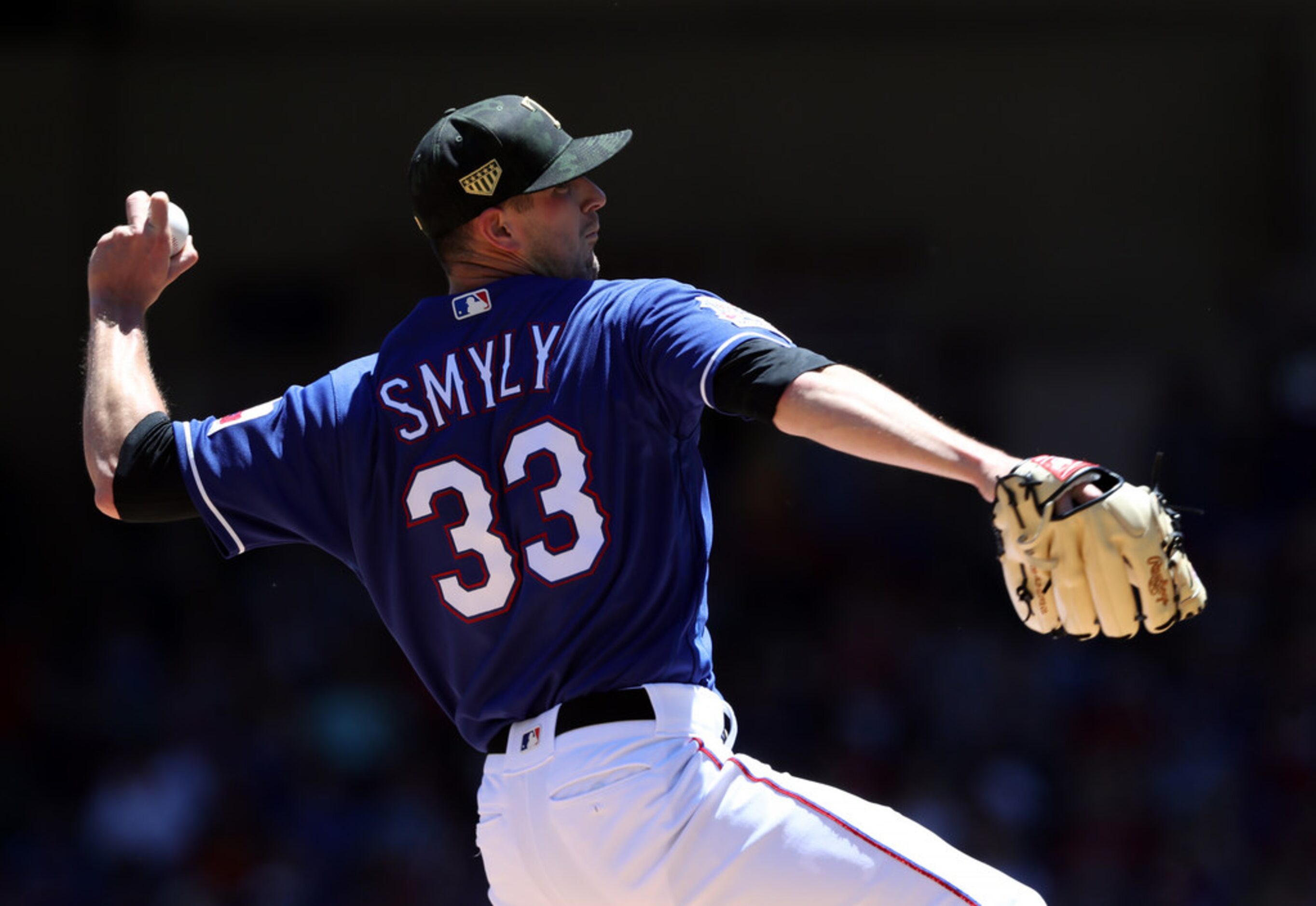 ARLINGTON, TEXAS - MAY 19: Drew Smyly #33 of the Texas Rangers throws against the St. Louis...