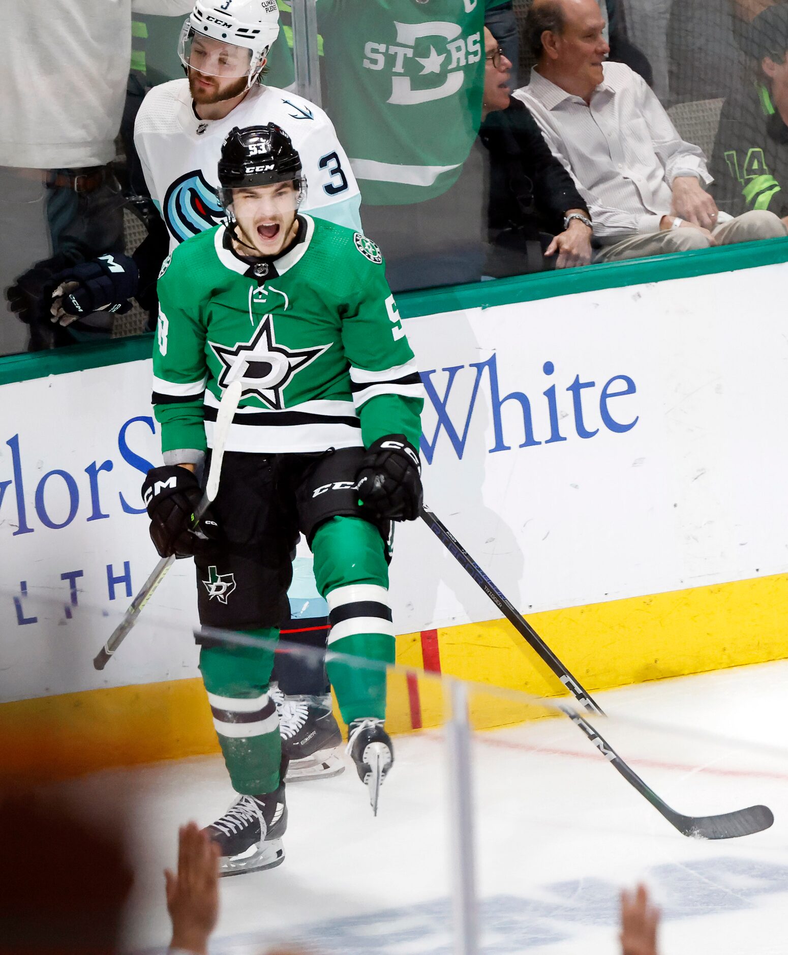 Dallas Stars center Wyatt Johnston (53) reacts after scoring on Seattle Kraken goaltender...