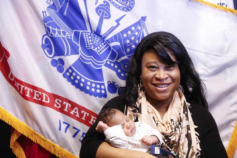 
Army veteran Autumn Elsey holds her 3-month-old, Thomas Lee Smith, at the VA medical...