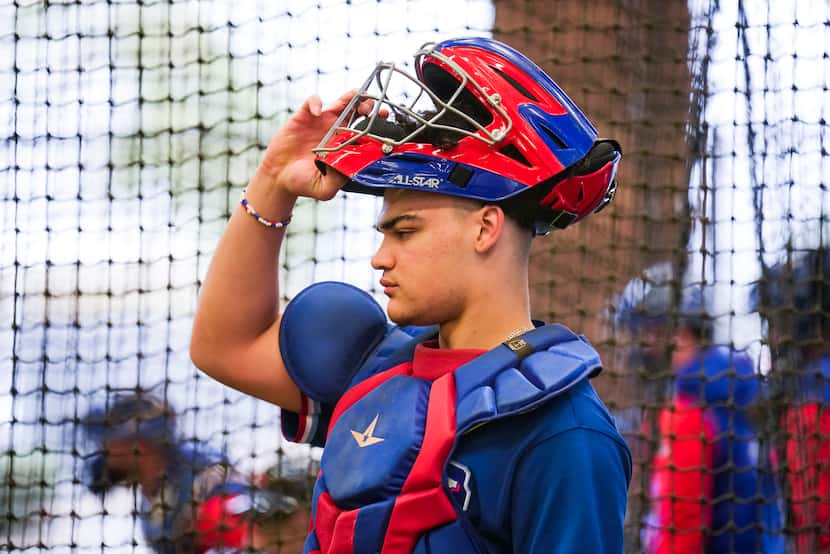 Catcher Ian Moller works in the bullpen during a Texas Rangers minor league spring camp...
