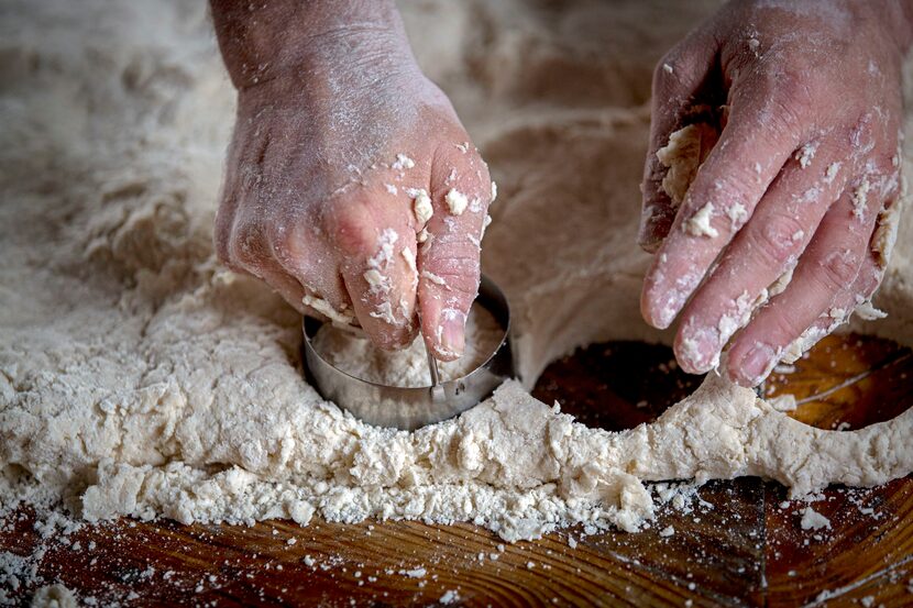 Chef Tim Byres uses a mold as he makes buttermilk biscuits at Chicken Scratch restaurant. 