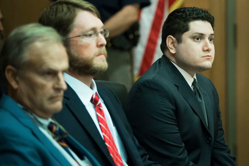 Enrique Arochi (far right) was found guilty of aggravated kidnapping. His defense attorneys...