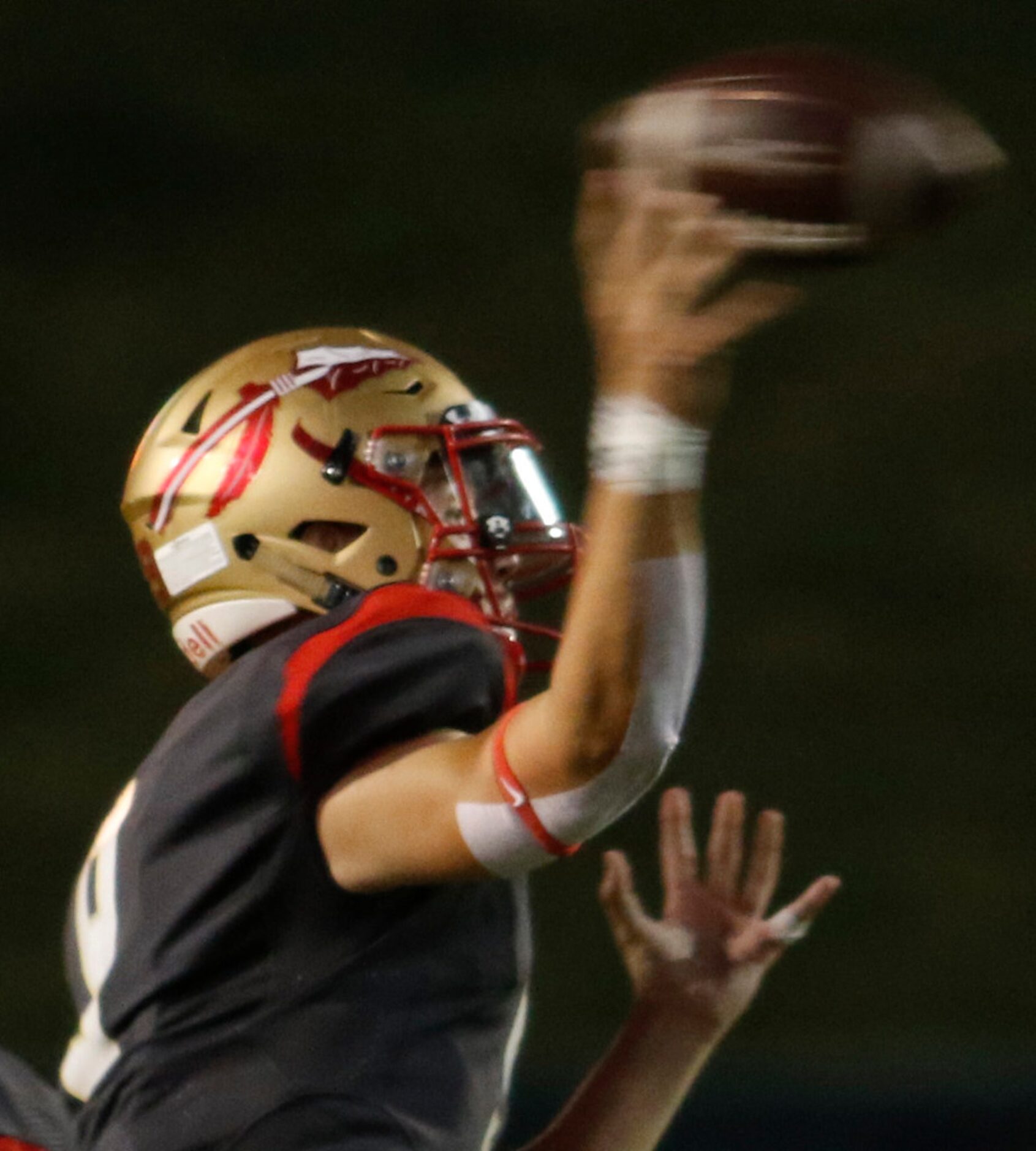 South Grand Prairie quarterback Drake Logan (9) launches a pass downfield during first half...