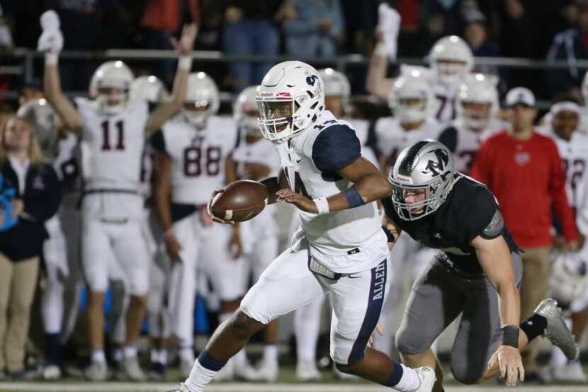 Allen quarterback Grant Tisdale (14) runs with the ball in the second quarter while...
