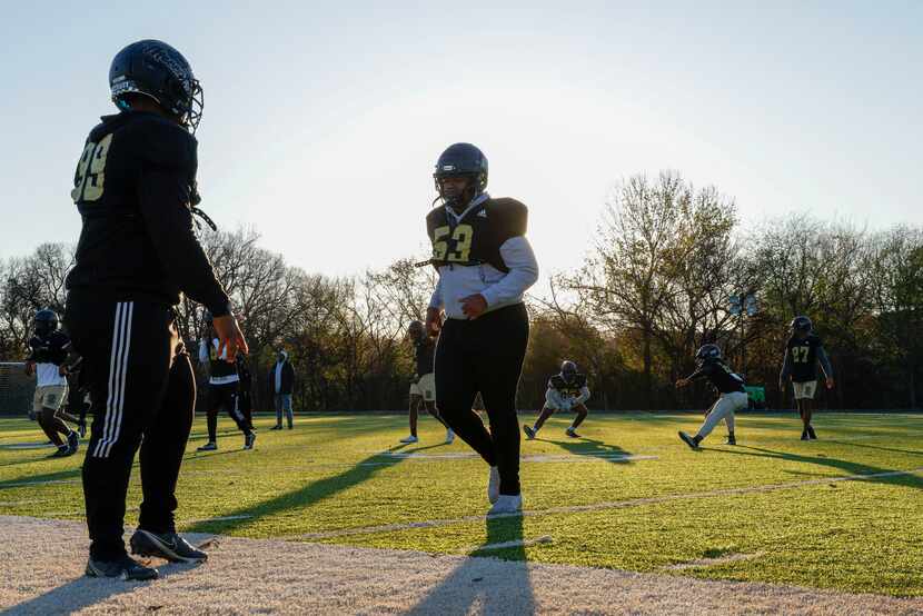 South Oak Cliff players warmup during a practice at South Oak Cliff High School in Dallas,...