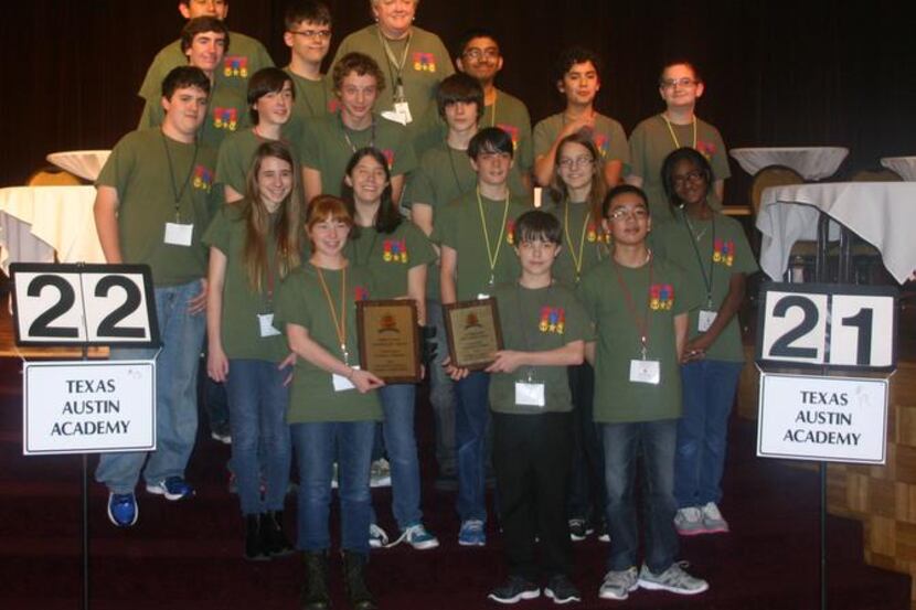 Students from the seventh- and eighth-grade pentathlon teams gather for a photo after...