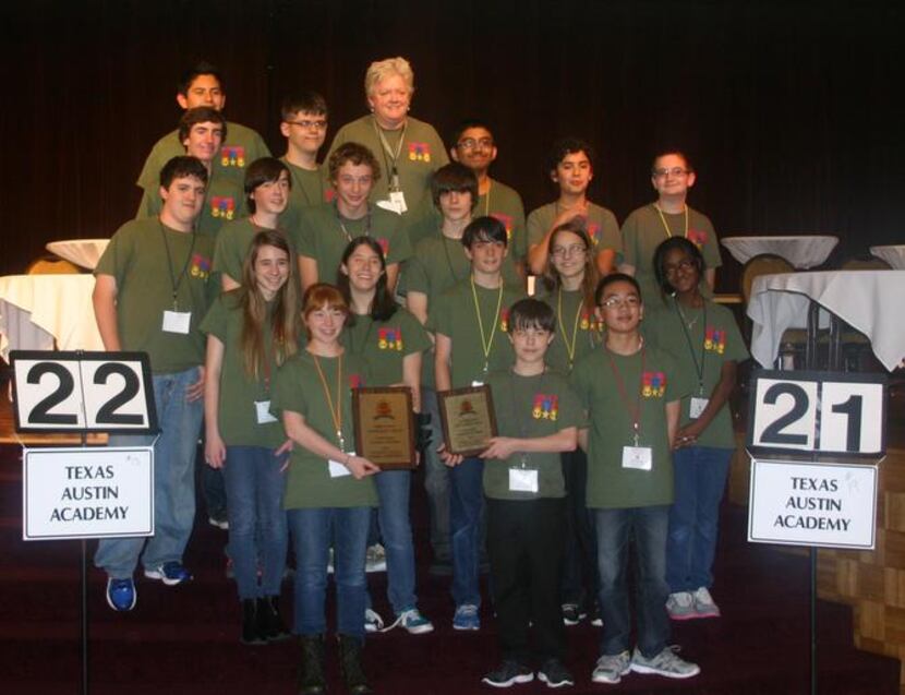 Students from the seventh- and eighth-grade pentathlon teams gather for a photo after...
