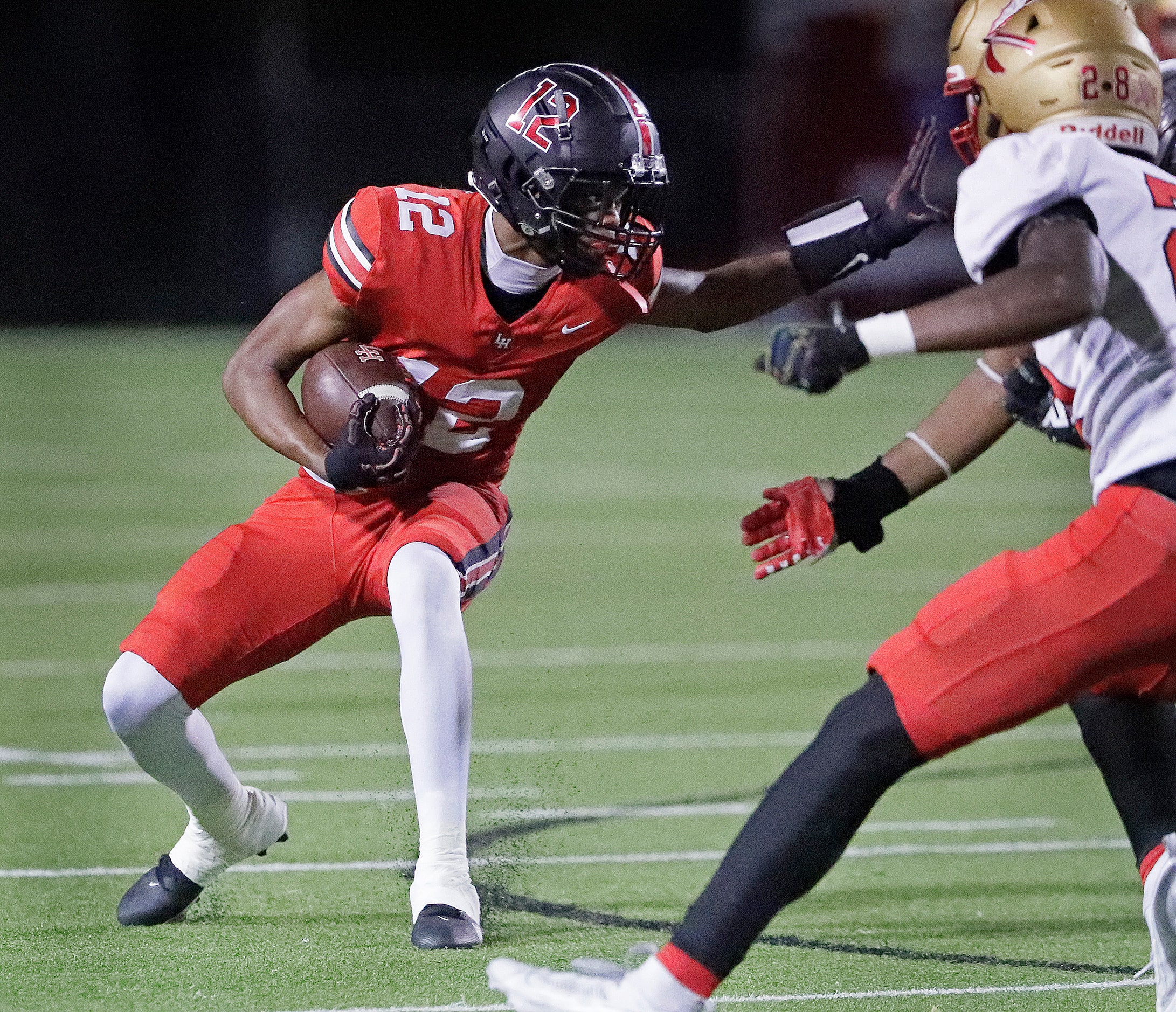 Lake Highlands High School running back Franklin Evans (5) runs after a catch during the...