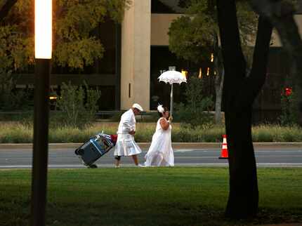 This Diner en Blanc Dallas couple has it figured out: Food goes in a rolling cooler, with...