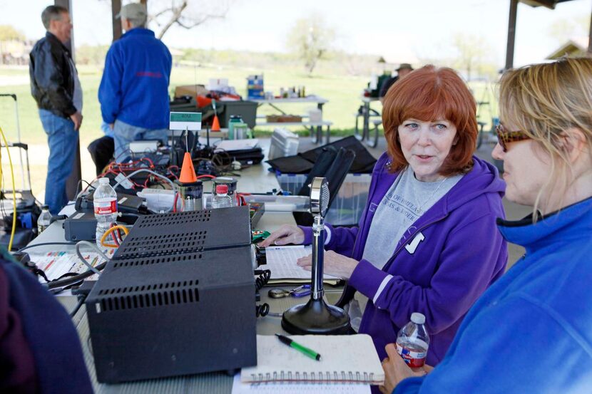 
Deborah Lewis (left) and Robin Evans listen in to radio user communication on a vintage...