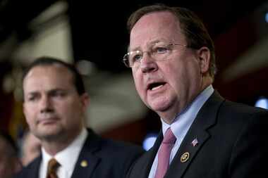  Rep. Bill Flores, R-Bryan, (right) and Sen. Mike Lee, R-Utah, (left) at a press conference...
