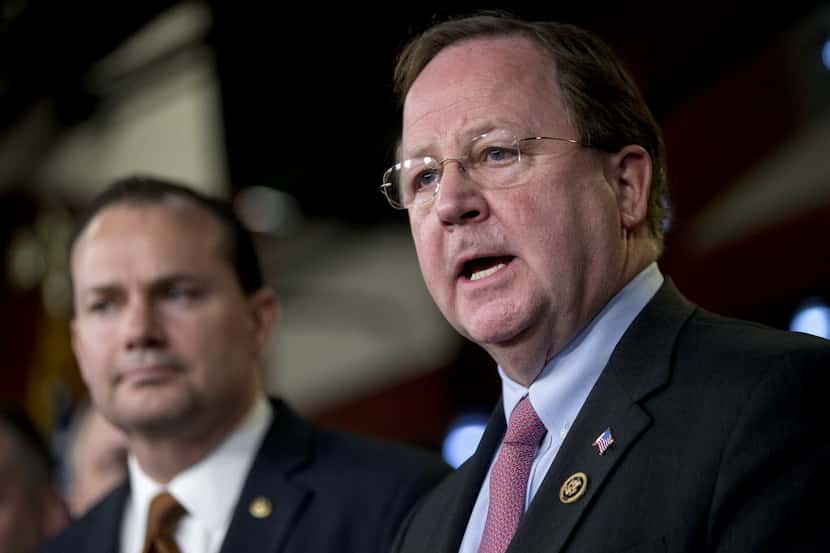  Rep. Bill Flores, R-Bryan, (right) and Sen. Mike Lee, R-Utah, (left) at a press conference...