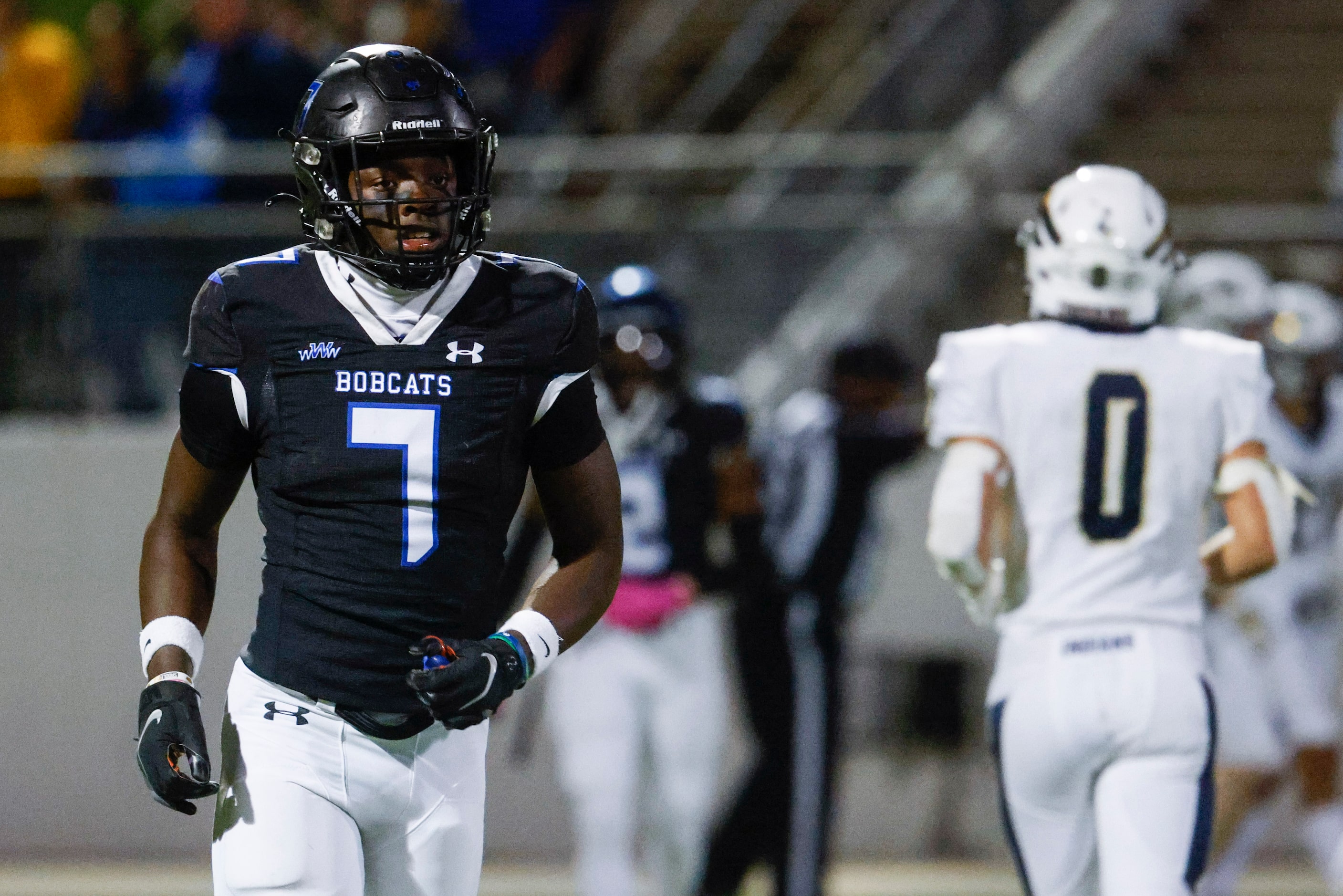 Byron Nelson’s David Kabongo (7) walks off the field during the second half of a football...