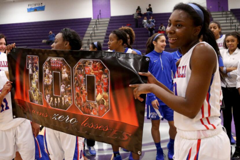 Duncanville Pantherettes guard  Keyana Smith (11) and DeAndra Wheeler (30) display a 100-0...