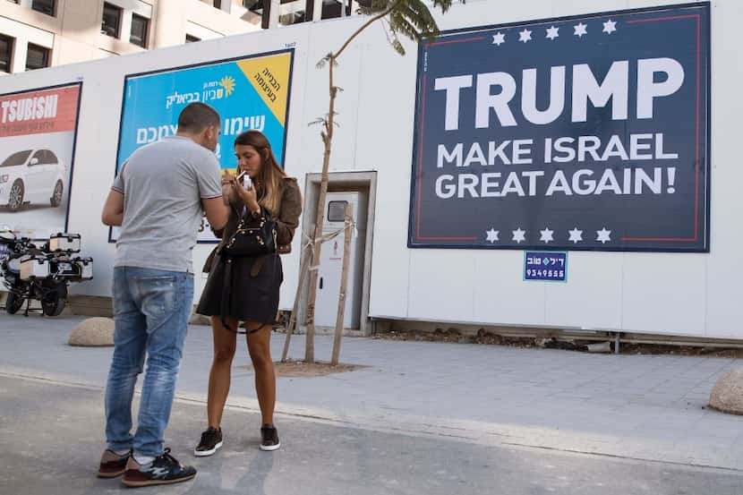 This file photo taken on November 15, 2016 shows 
a placard reading "Trump Make Israel Great...