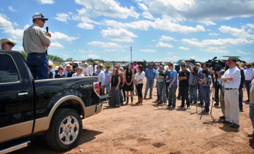  Clay County landowner Tommy Henderson addresses a group during a news conference about a...
