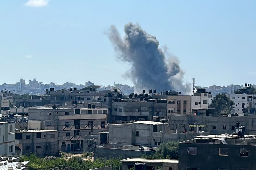 Smoke rises from an Israeli airstrike in the Jebaliya refugee camp in the Gaza Strip,...