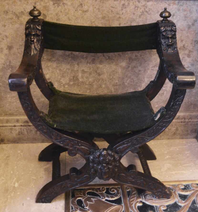 This mahogany folding chair, owned by Robert and Elizabeth Barrett Browning when they lived...