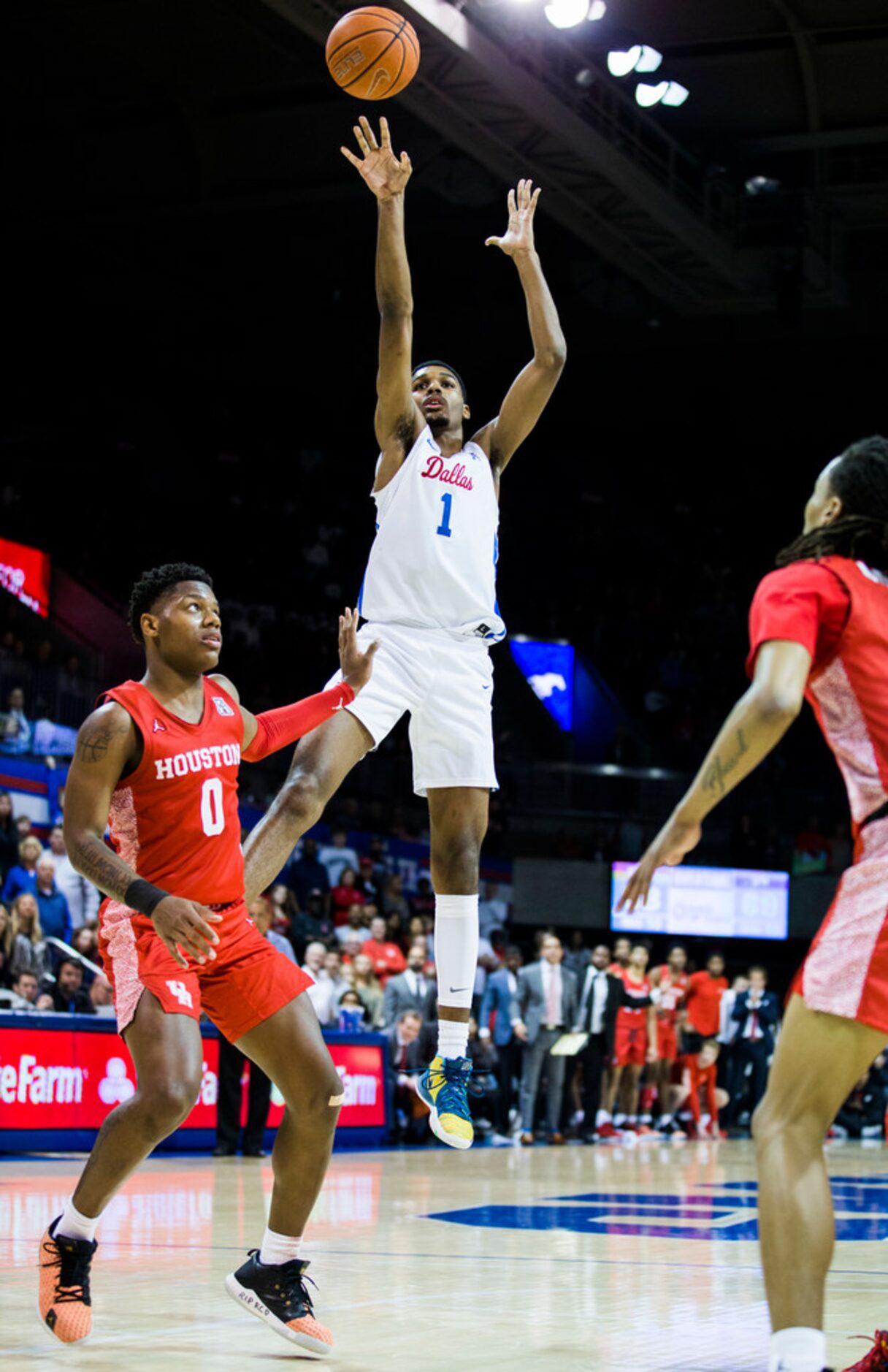 Southern Methodist Mustangs forward Feron Hunt (1) takes a shot over Houston Cougars guard...