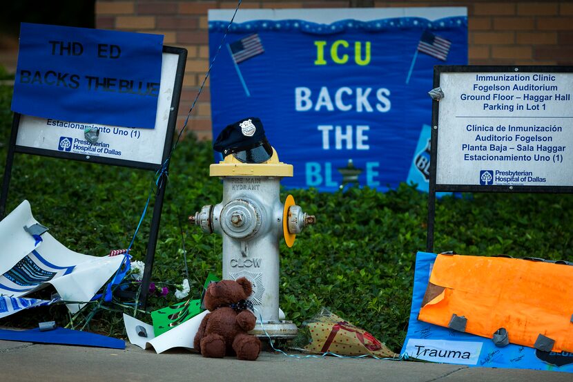 Items showing support for Dallas police officers killed and wounded in a shooting at a Home...