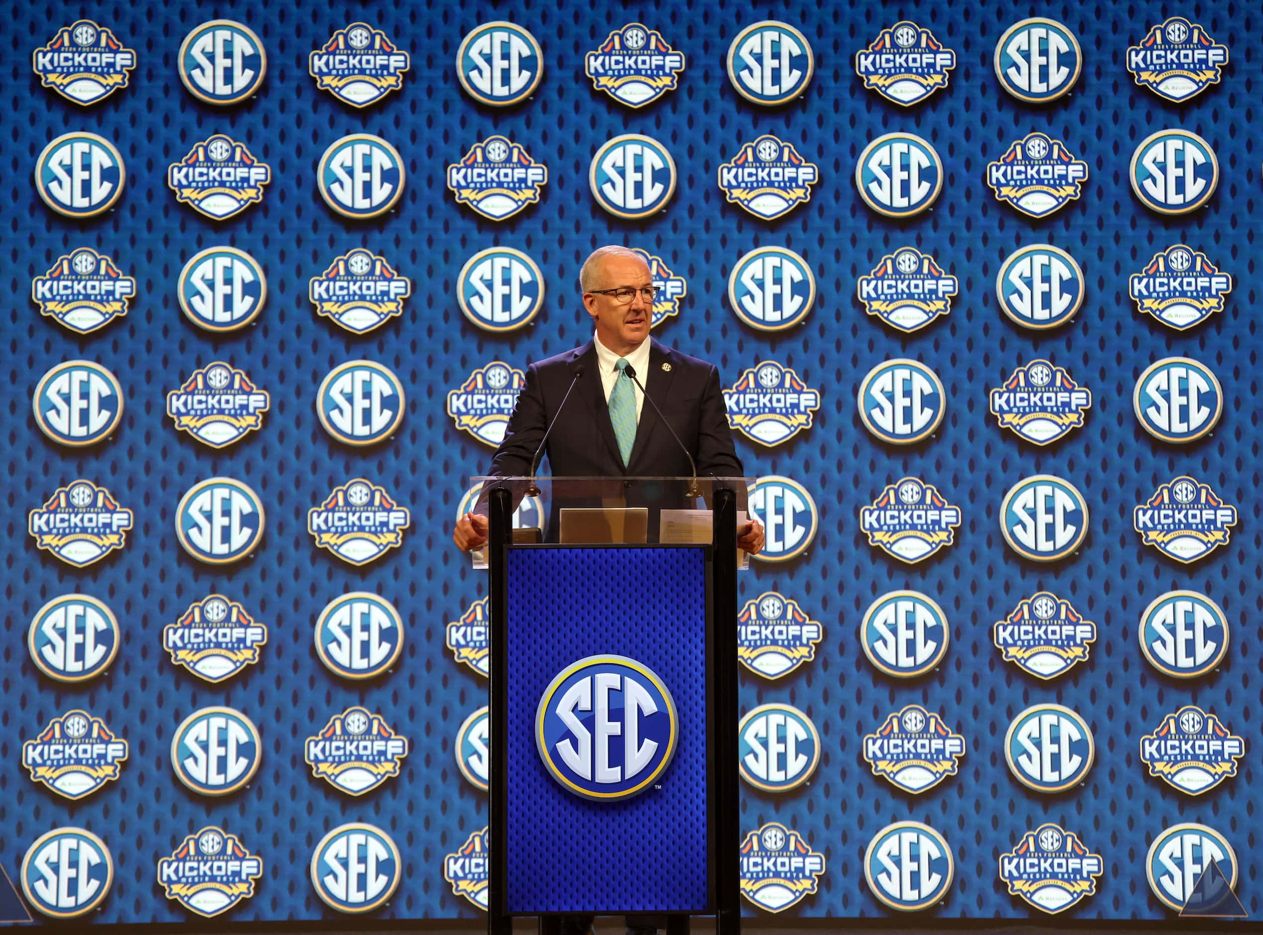 South Eastern Conference Commissioner Greg Sankey addresses media members during his opening...