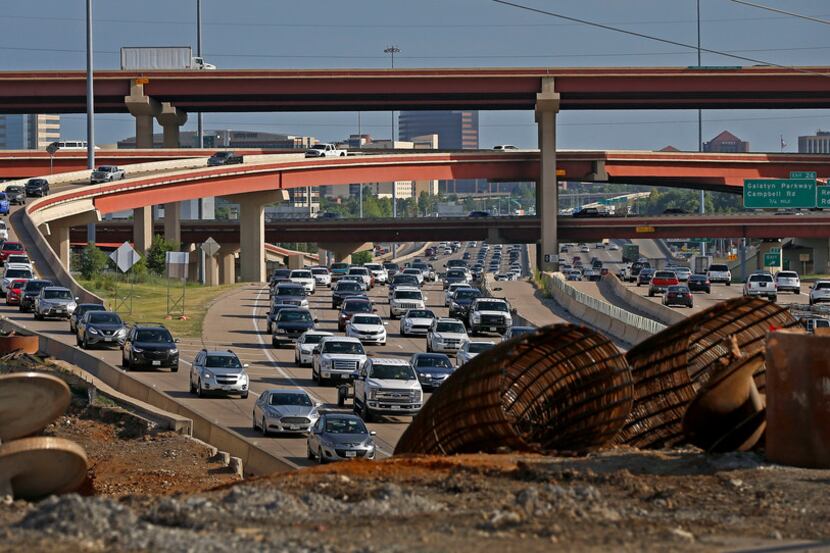 Traffic builds up on northbound Highway 75 near the Plano Parkway bridge as President George...