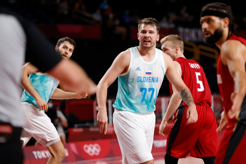 Slovenia’s Luka Doncic (77) looks for the foul call after a made basket in play against...