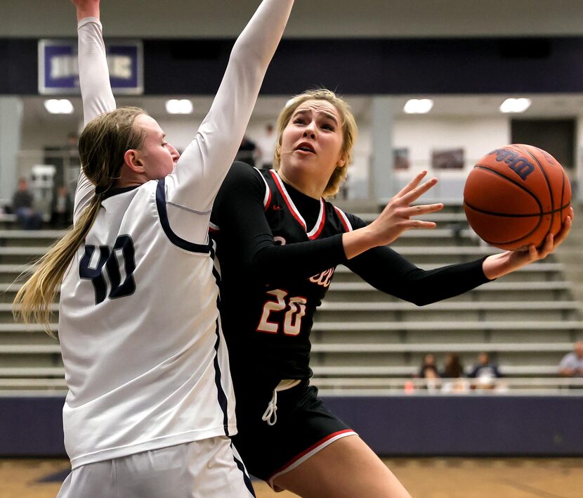 Coppell guard Julianna Lamendola (20) tries to go around Flower Mound guard Madison Cox (40)...