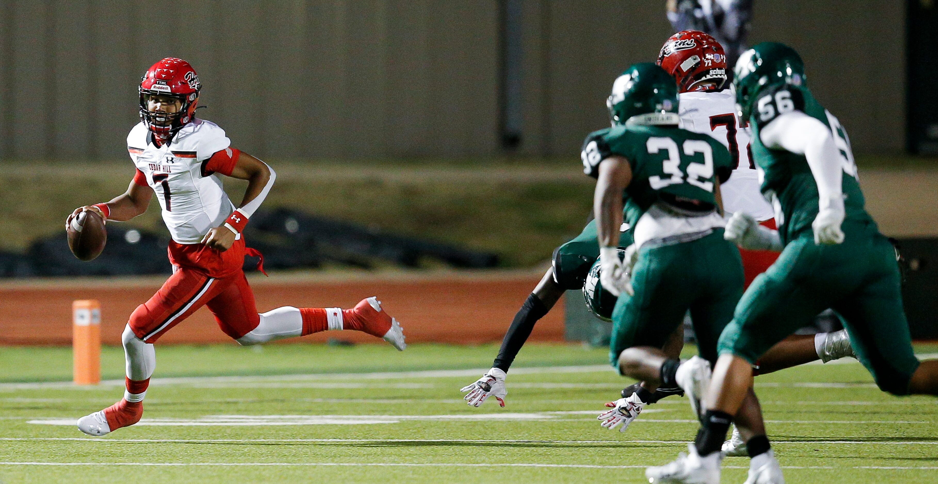 Cedar Hill senior quarterback Kaidon Salter (7) looks for an open receiver during the first...