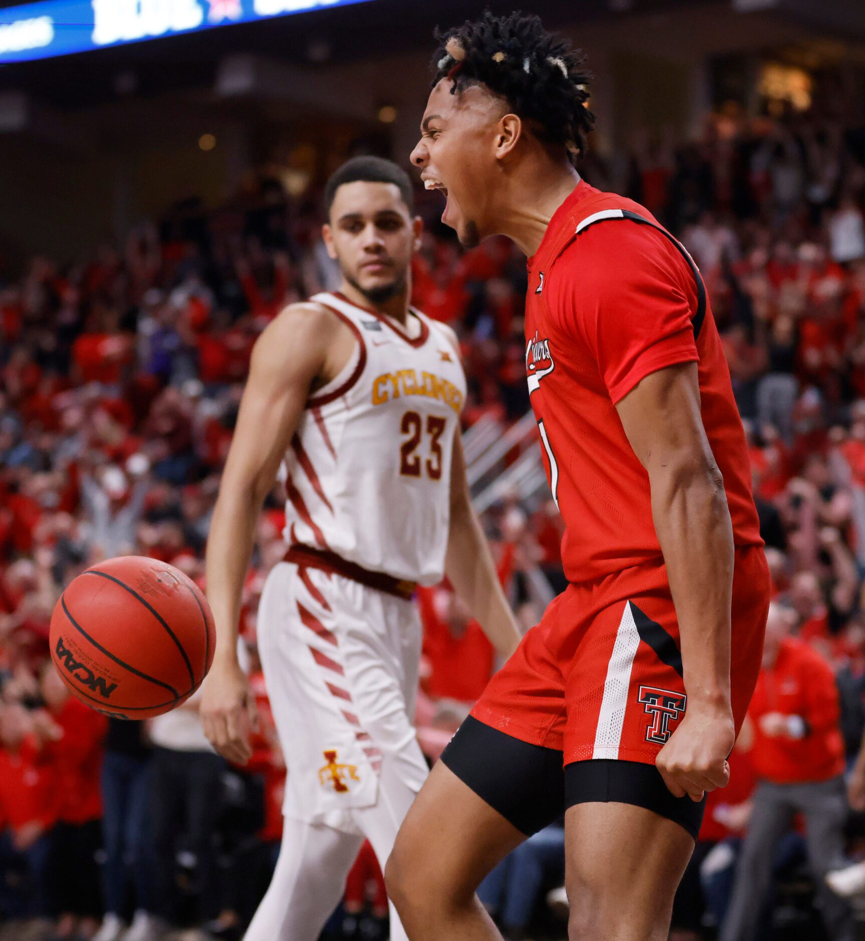 Texas Tech Red Raiders guard Terrence Shannon Jr. (1) reacts after his alley-oop dunk in the...