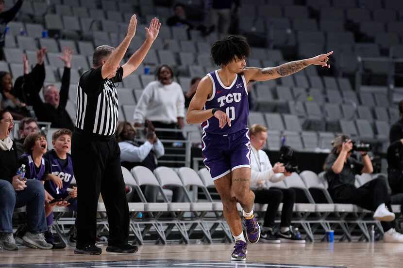 TCU guard Micah Peavy (0) celebrates after sinking a 3-point basket against Arizona State...
