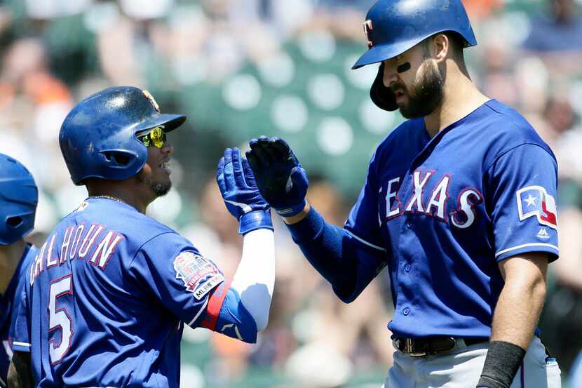 DETROIT, MI - JUNE 27:  Joey Gallo #13 of the Texas Rangers receives a high-five from Willie...