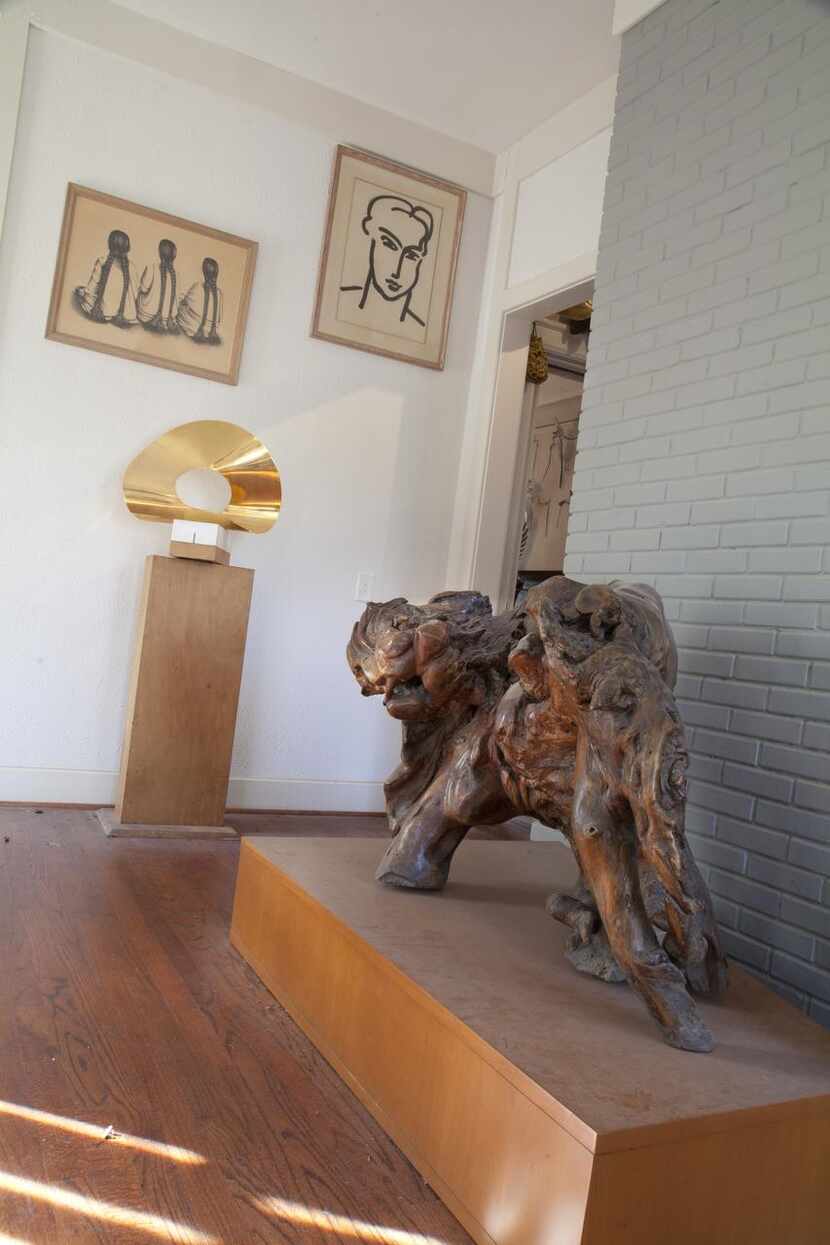 From left:  A Bos Siqueros Mexican print, a Max Bill sculpture, a Matisse print and a...